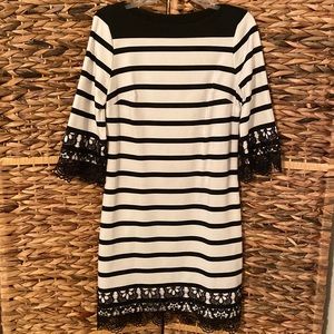 Beige by eci dress.  Size 6. Black and white. Sits just at or just above knees.